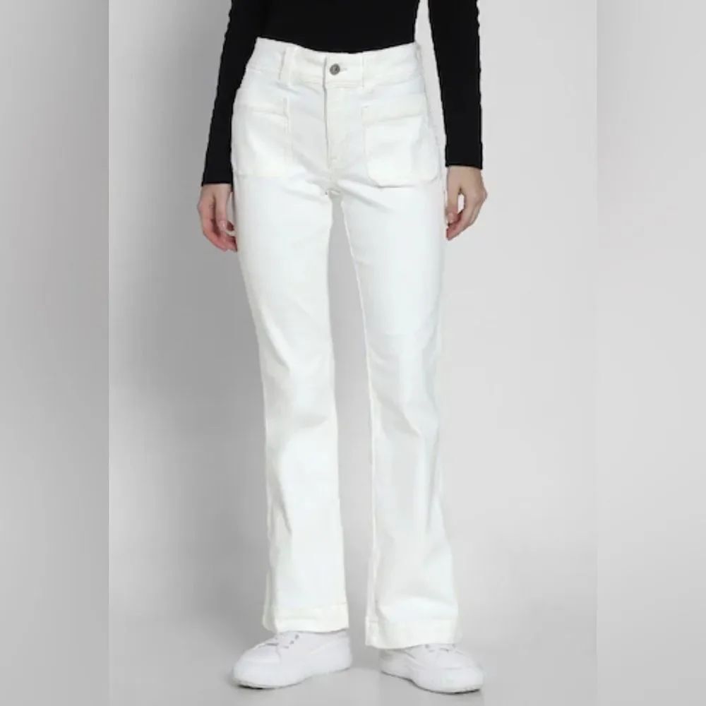 American Eagle Outfitters Cream Flare Jeans